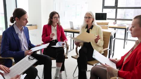 group of professionals engaged in a collaborative meeting or discussion