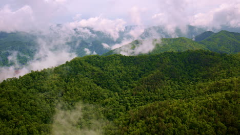 Epic drone flight over fog-filled Smoky Mountains.
