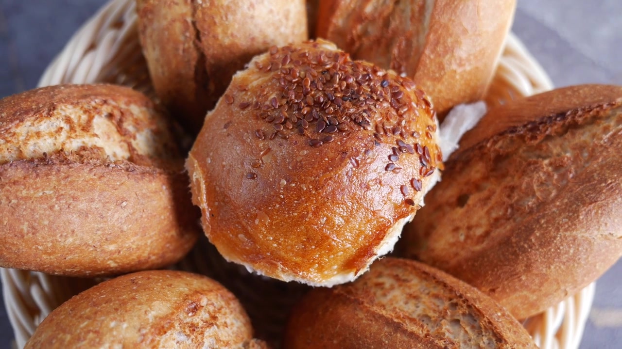 Freshly Baked Bread Rolls in a Wicker Basket