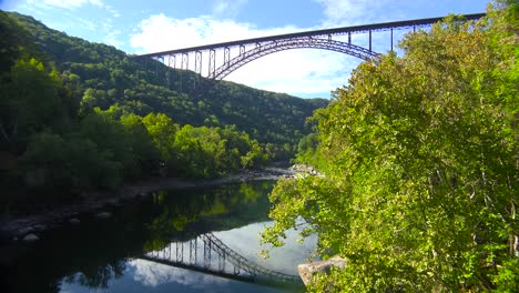 low angle establishing shot of the new river gorge bridge in west virginia 1