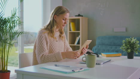 woman watching tablet