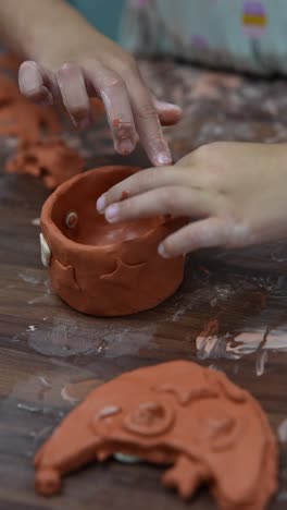 children making pottery