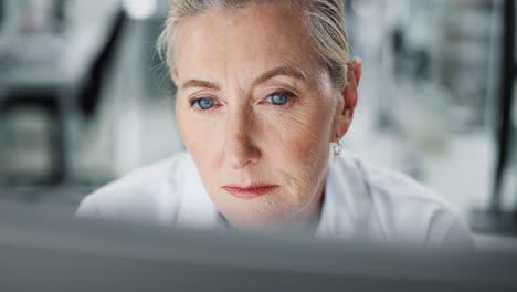 mature woman scientist in laboratory