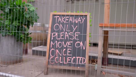 sign in a closed restaurant in london, take-away food only, shutdown during covid-19 coronavirus pandemic