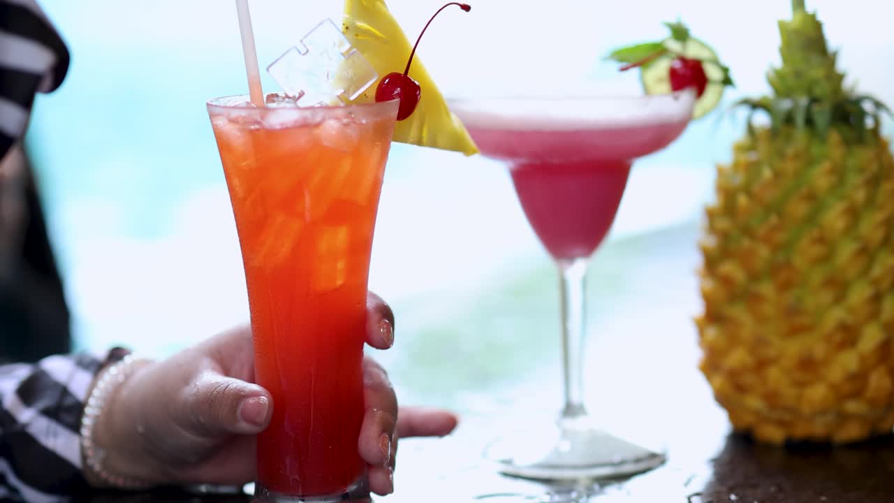 Refreshing drinks enjoyed near a pool in Krabi