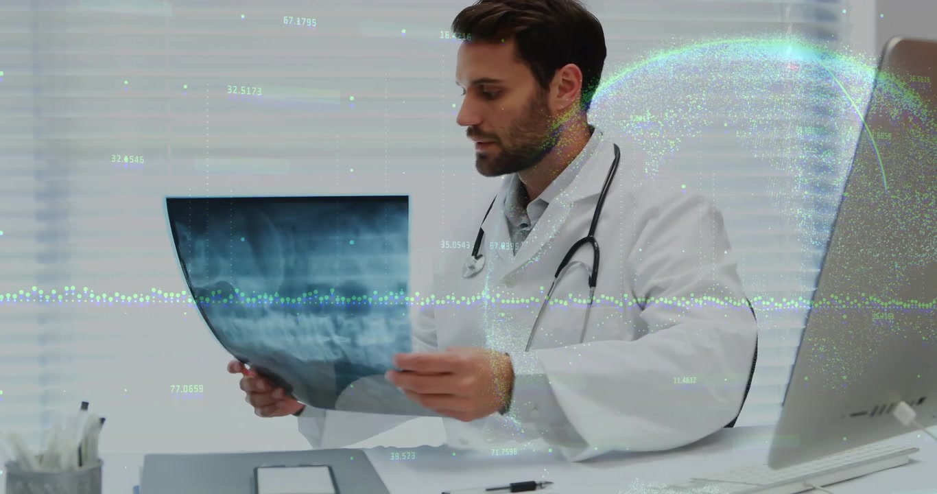 Male doctor holding up X-ray film in medical office, displaying animated waveform and data overlays
