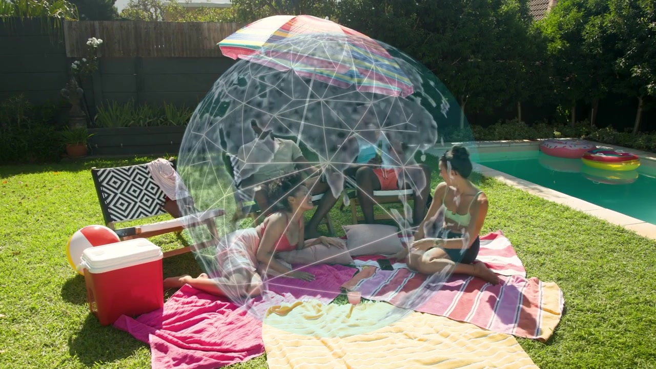 Hologram globe appearing and expanding, overlaying friends on towels and sparking tech chat