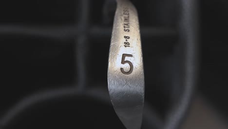close-up of a 5 iron golf club