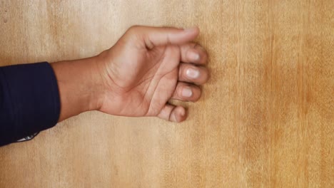 young man hand knocking door