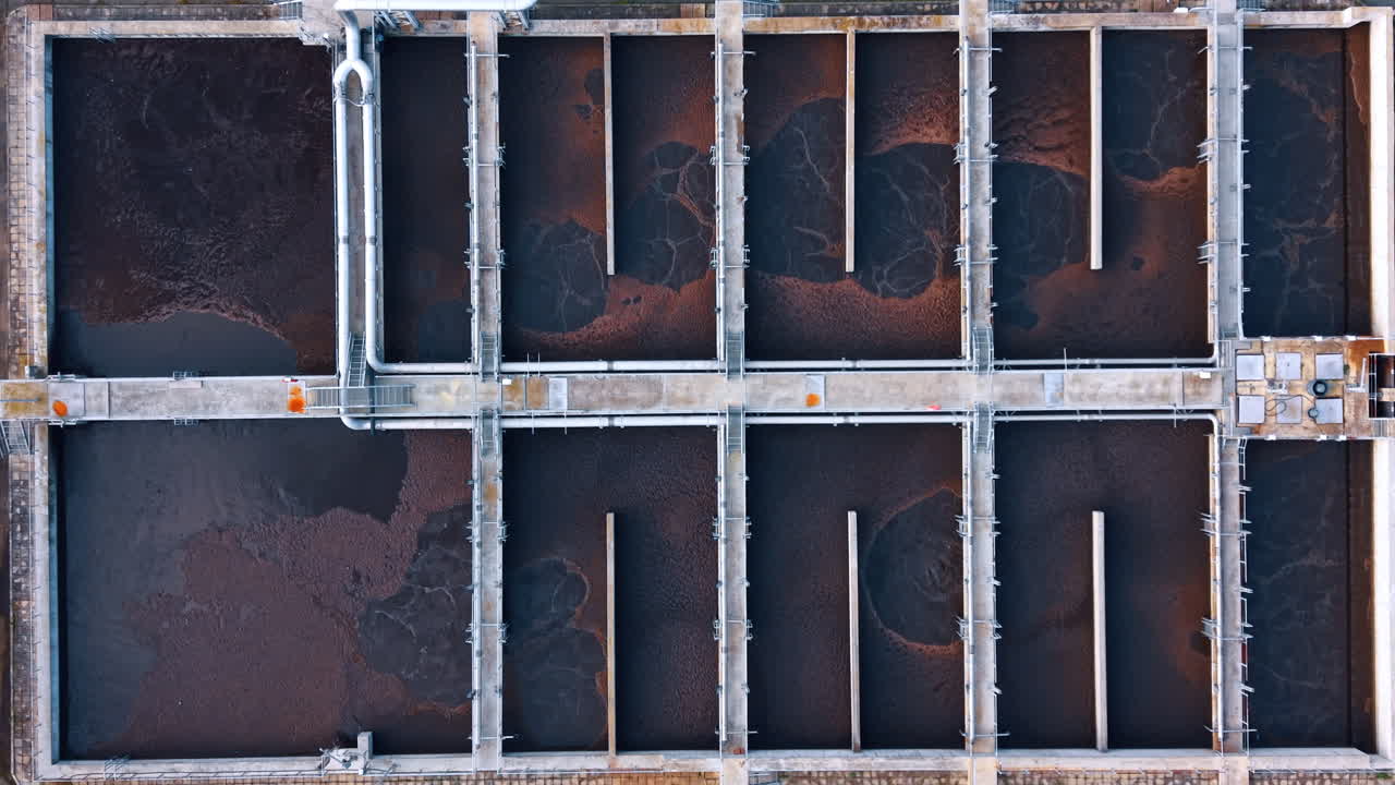 Large reservoirs are being filled with waste water from the city sewage. Environment friendly technology for saving the nature resources. Top view