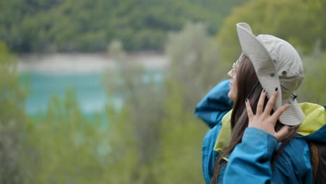 woman hiking in nature by a lake