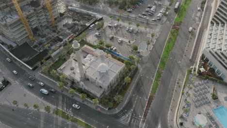 aerial video rotating around a small mosque on the coast in tel aviv, israel