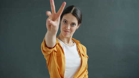woman gesturing with hand