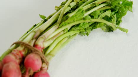 bunch of radish placed against white background 4k 4k