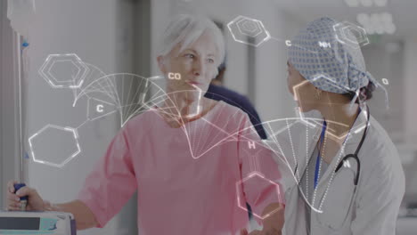 animation of dna strand and data over asian female doctor with female patient