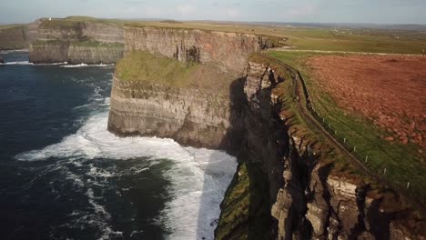 drone view of the very high cliffs of moher, ireland