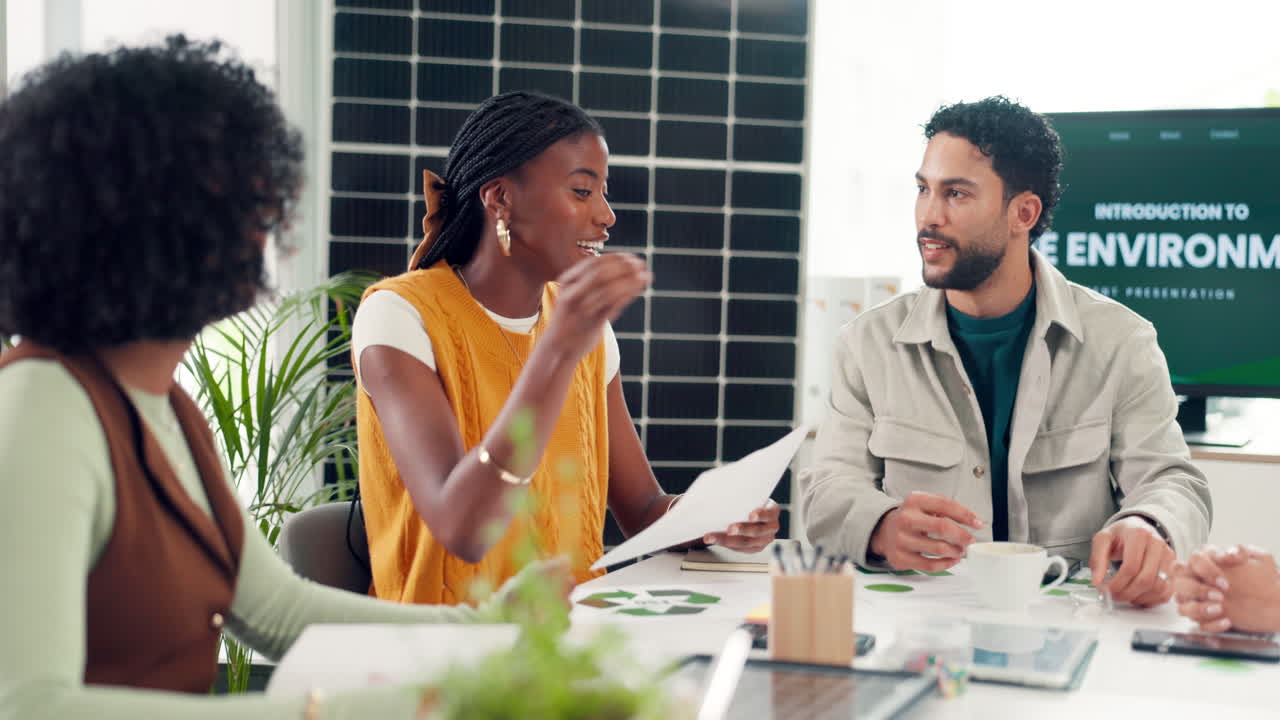 Diverse Business Team Discussing Environmental Strategy in Office