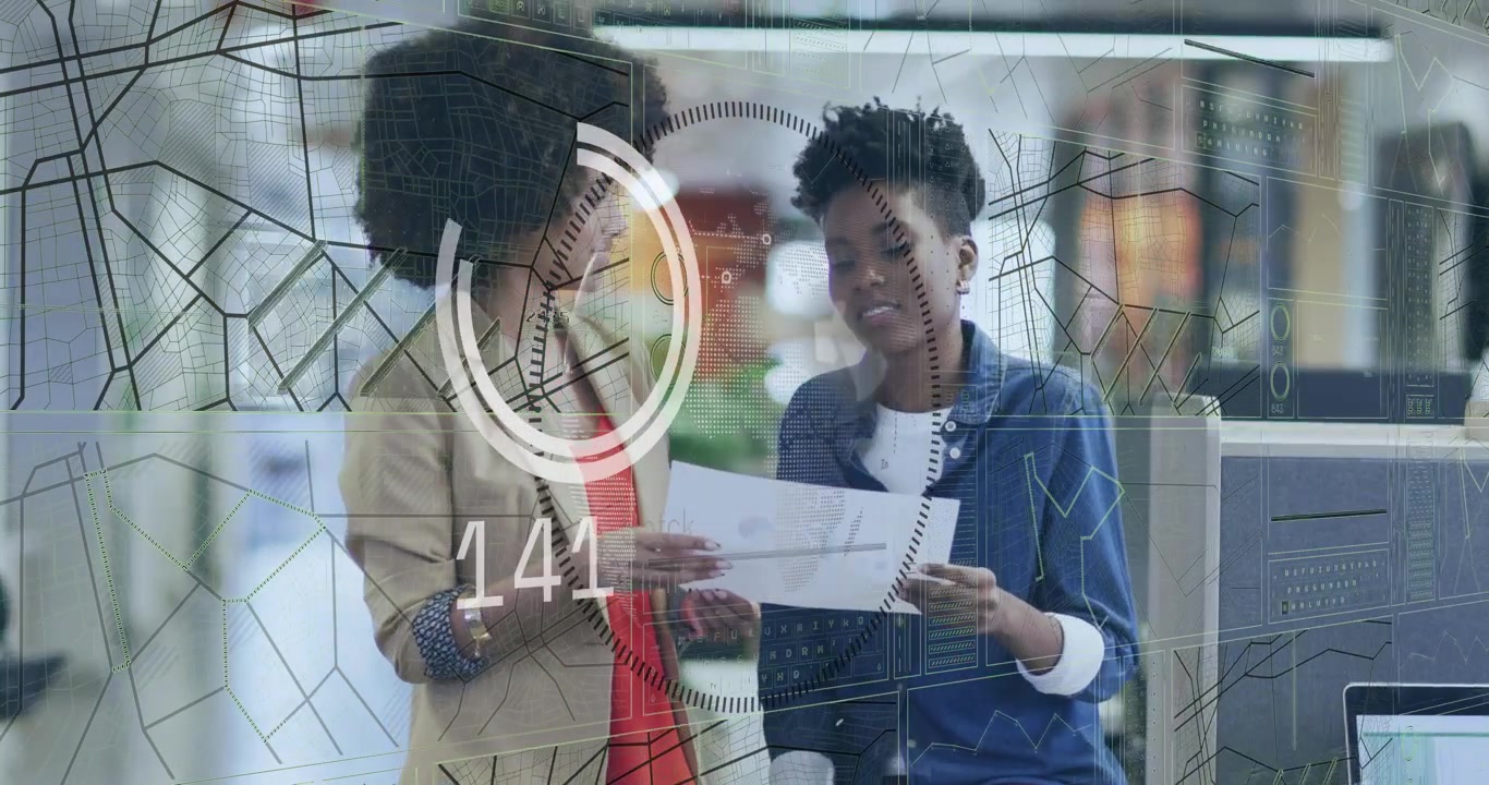 Two Businesswomen Discussing Documents with Digital Data Overlay in Office