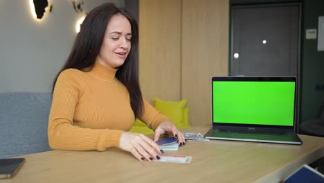 a female travel agent gives passports and airline tickets. travel concept. planned vacation