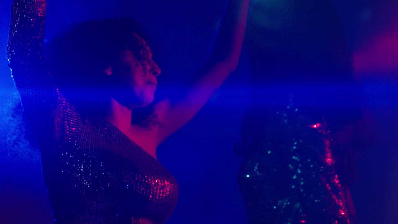 Close Up Of Two Women In Nightclub Bar Or Disco Dancing With Sparkling Lights 23