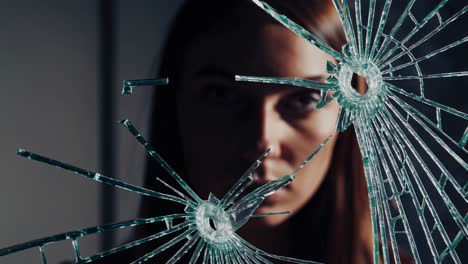 woman behind broken glass