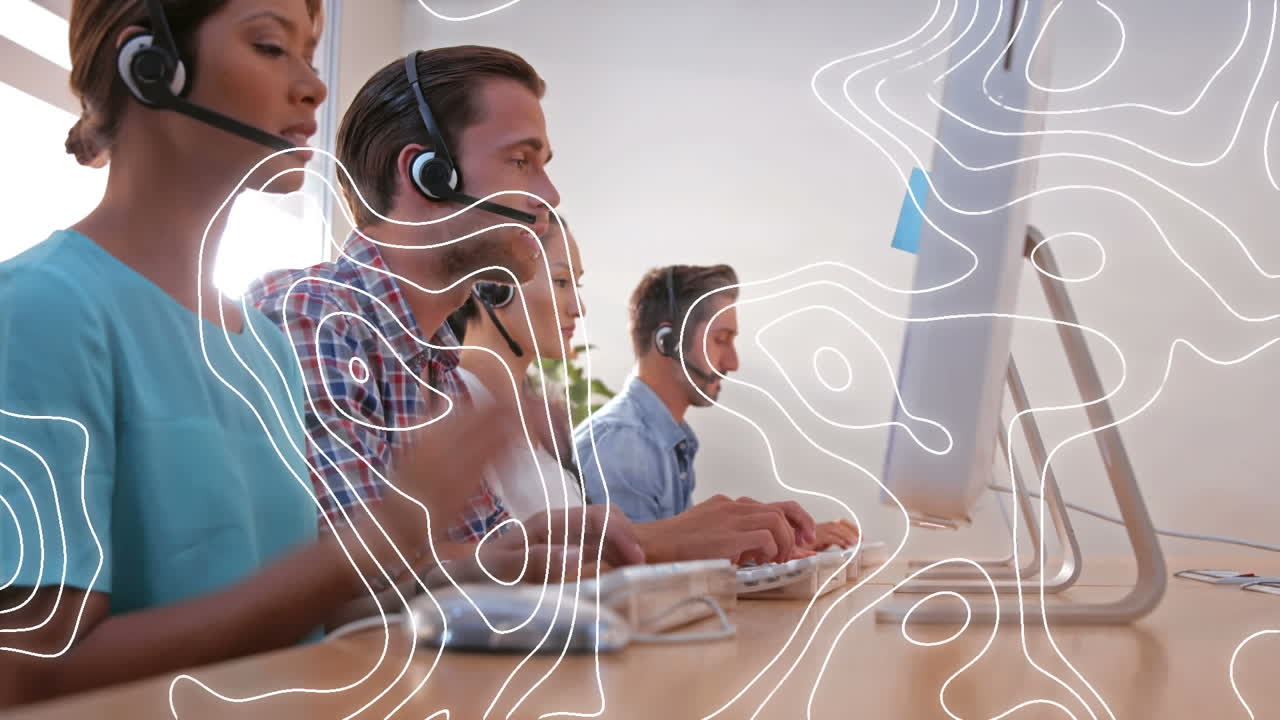 Animation of moving lines over business people wearing phone headsets