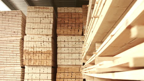 wooden boards stacked in warehouse after the process of woodworking