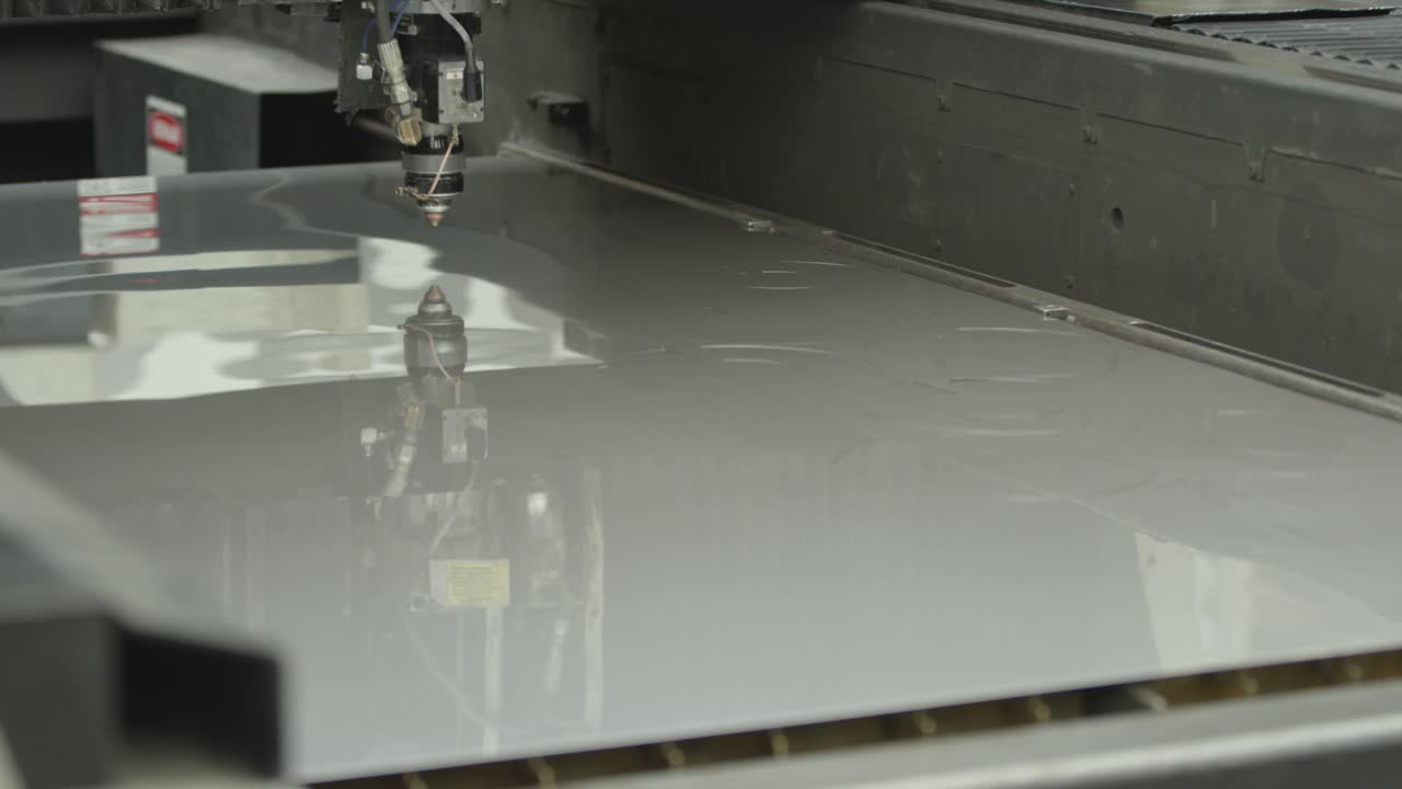 Laser cutter cutting metal plates