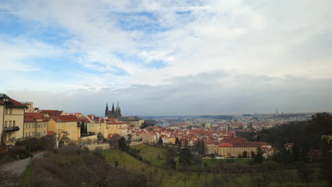 timelapse of historical part of prague with sunny blue skyline