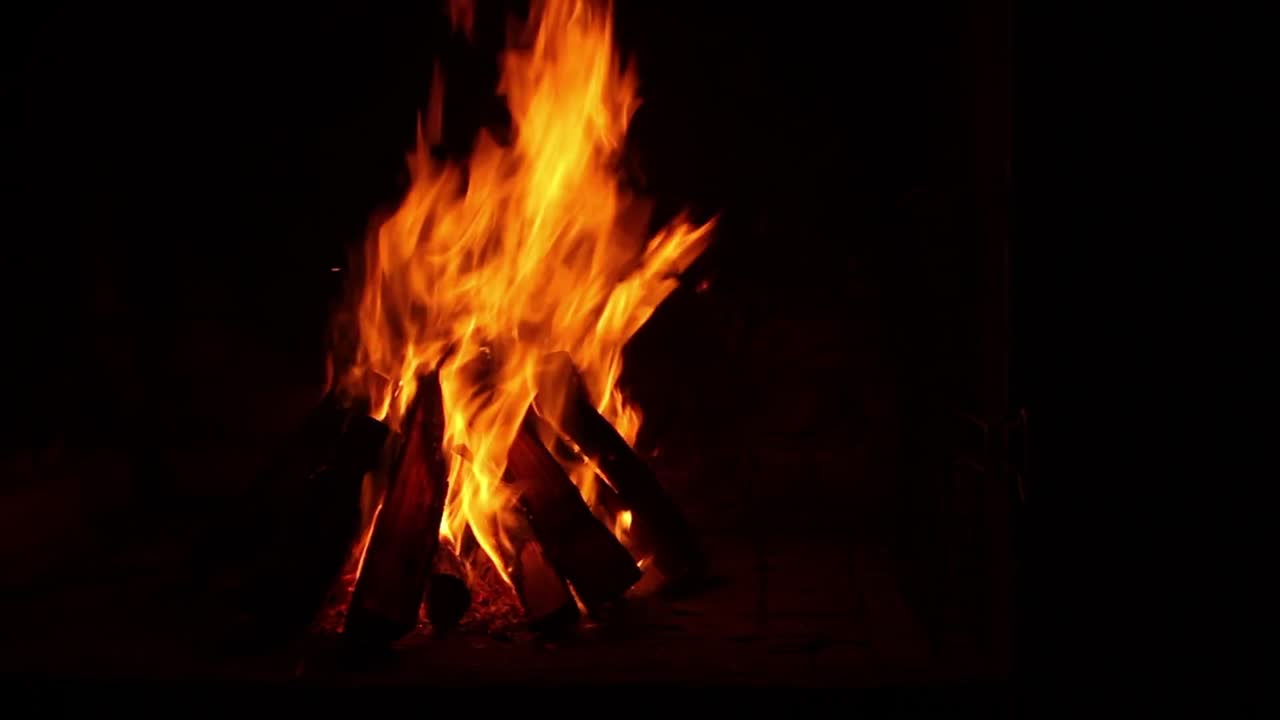 A large wood fire with flames