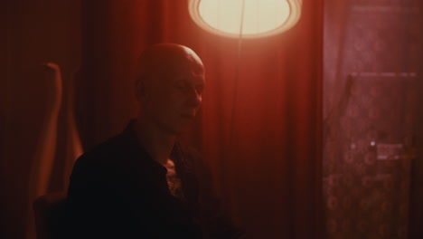 person in a dimly lit room