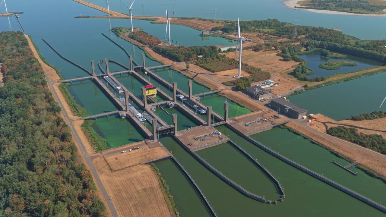 Aerial View of Cargo Ships Passing Through Canal Lock System