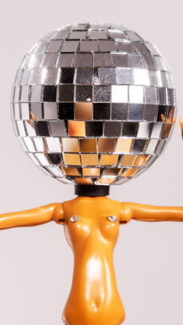 discodoll dancing on turntable