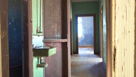 colorful walls of an abandoned building in the gem mining ghost town of kolmanskop namibia