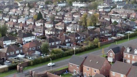 typical northern english town suburban housing estate aerial view dolly left tilt up