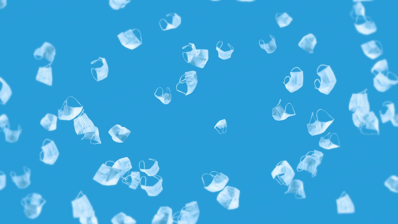 파란색 바탕에 많은 색 마스크를 날리는 의료 개념, 수술 보호 마스크, 마스크 회전의 3d 애니메이션, 루프 애니메이션.