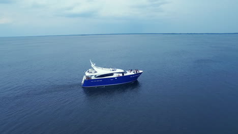 luxury ship sailing tranquil sea. aerial landscape of yacht racing sea bay