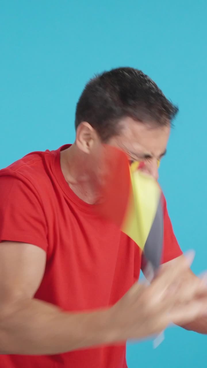 Man cheering for Belgium, angry with the decision of referee