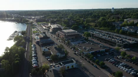 Aerial-panorama,-rural-American-lakeside-small-town-in-Wayzata,-Minnesota