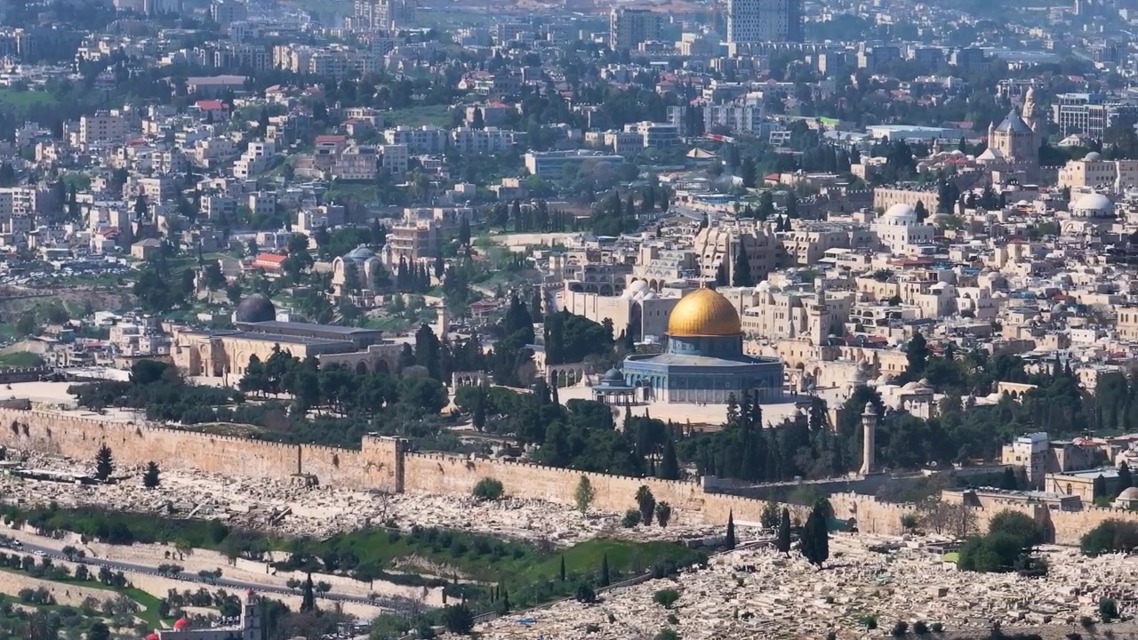 Panoramic aerial shot showing Al Aqsa Mosque Dome of the Rock and the ancient Southern Wall of the Temple Mount in Jerusalem