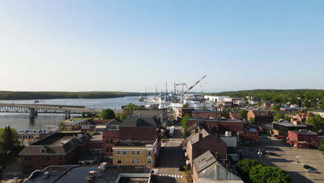 drone aerial footage of city of bath and bath iron works in maine