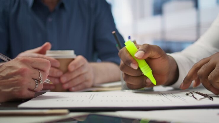 Middle aged couple engaged in a consultation with financial advisor