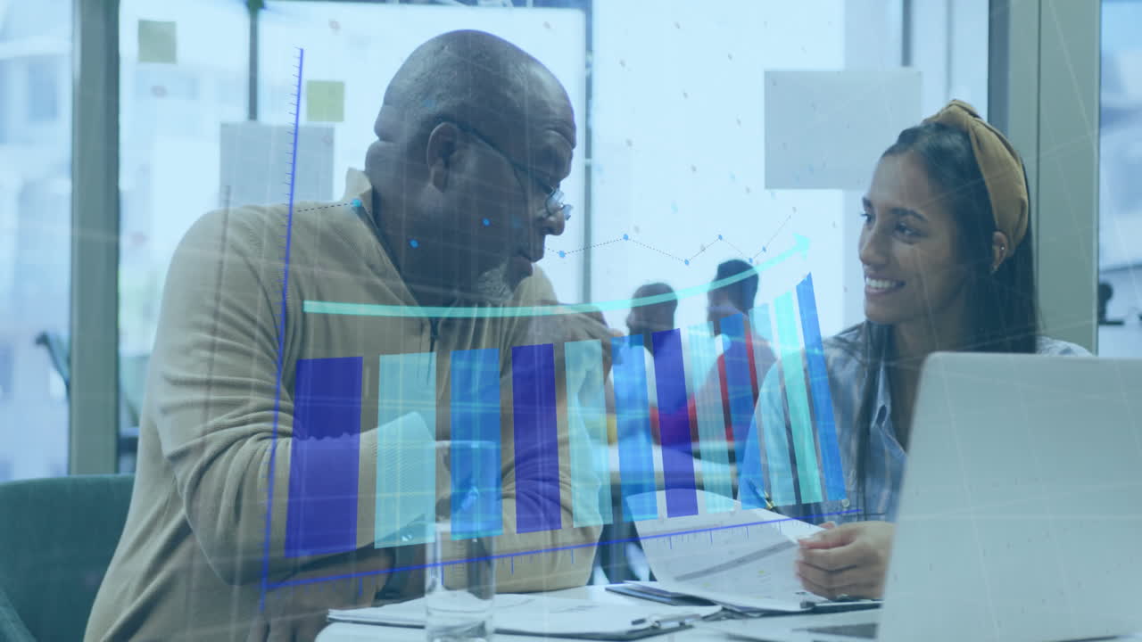 Animation of arrow on bar graph over diverse coworkers sharing ideas on desk in office