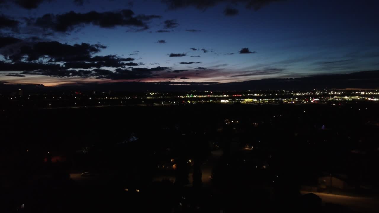 Night neighbourhood suburb sun set approach aerial drone