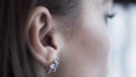 close-up of woman's earrings