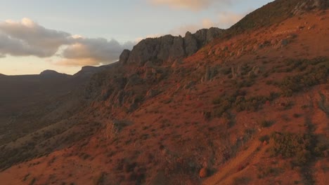 mountainous landscape at sunset