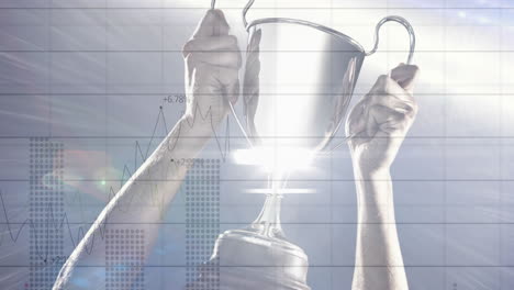 animation of data processing over caucasian sportsman holding cup