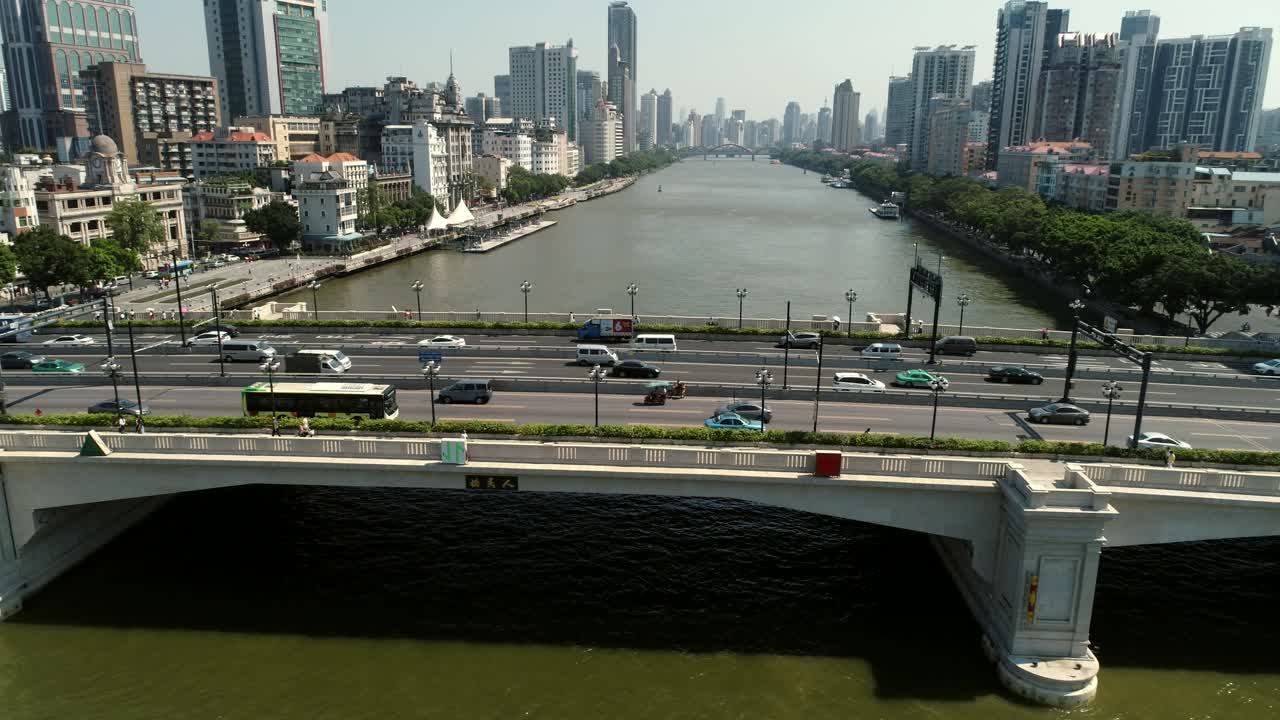 Shamian Island guangzhou china, aerial from riverside along island, modern city one side and historic colonial to the other, -famous area of world top city, 4k, d-log,