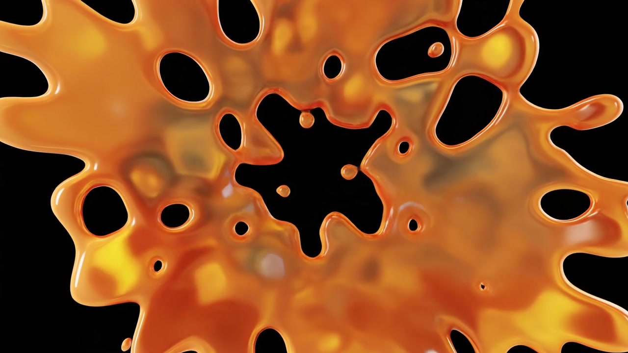 Liquido arancione che schizza e si espande al rallentatore