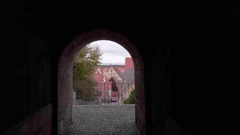 a drone flies through a short tunnel